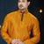 Mustard kurta with a subtle textured finish, accented by a dark embroidered band collar and placket.