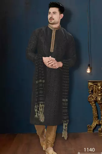Charcoal-black kurta with a subtle geometric pattern and gold-trimmed collar, placket and cuffs