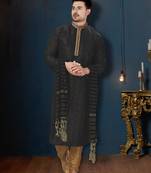 Charcoal-black kurta with a subtle geometric pattern and gold-trimmed collar, placket and cuffs