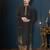 Charcoal-black kurta with a subtle geometric pattern and gold-trimmed collar, placket and cuffs
