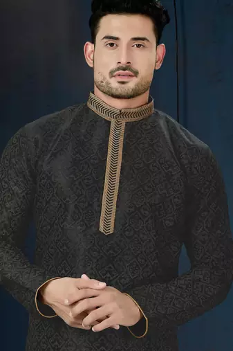 Charcoal-black kurta with a subtle geometric pattern and gold-trimmed collar, placket and cuffs