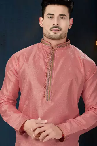 Dusty-rose kurta with a subtle textured finish and ornate contrasting trim along the collar and placket
