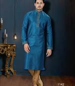 Teal-blue kurta with a subtle jacquard pattern and fine gold piping on the collar, placket and cuffs