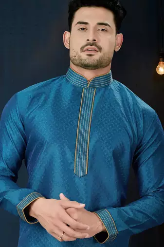 Teal-blue kurta with a subtle jacquard pattern and fine gold piping on the collar, placket and cuffs