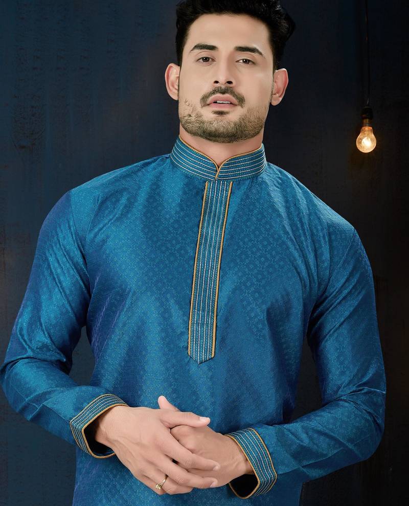 Teal-blue kurta with a subtle jacquard pattern and fine gold piping on the collar, placket and cuffs