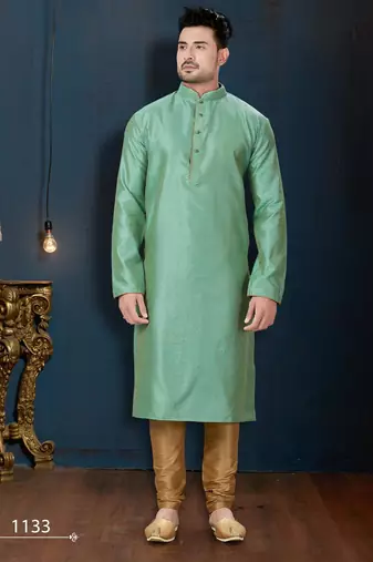 Sea-green kurta with an elegant tonal jacquard pattern, stand collar and gold-buttons, paired with gold trousers.