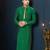 Emerald-green kurta with subtle gold motifs, finished with a gold-trimmed band collar with gold trousers.