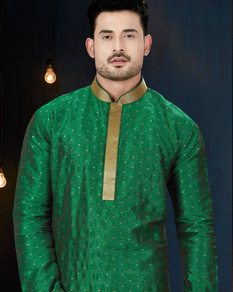 Emerald-green kurta with subtle gold motifs, finished with a gold-trimmed band collar with gold trousers.