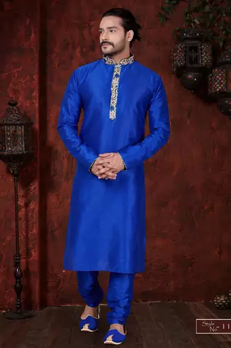 Royal-blue kurta with cream-and-blue floral detailing on the band collar and placket, paired