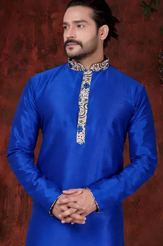 Royal-blue kurta with cream-and-blue floral detailing on the band collar and placket, paired