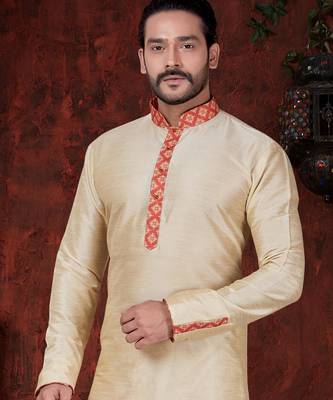 Fawn kurta set with elegant coral-red patterned trim on the collar, placket, and cuffs—simple festive wear 2