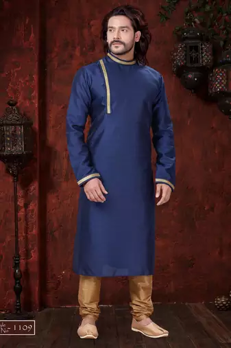 Blue kurta with elegant gold trim, paired with gold trousers—simple, refined festive style.