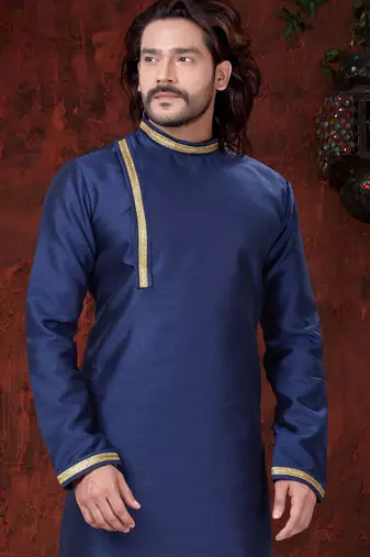 Blue kurta with elegant gold trim, paired with gold trousers—simple, refined festive style.