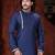 Blue kurta with elegant gold trim, paired with gold trousers—simple, refined festive style.