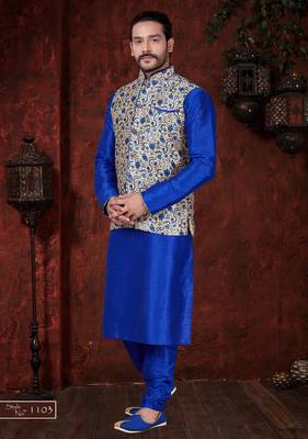 Royal-blue kurta set with a cream floral nehru jacket featuring blue detailing—an elegant festive look. 1