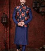 Navy kurta set with a striking floral nehru jacket—an elegant choice for festive occasions.