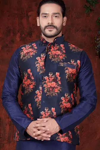 Navy kurta set with a striking floral nehru jacket—an elegant choice for festive occasions.
