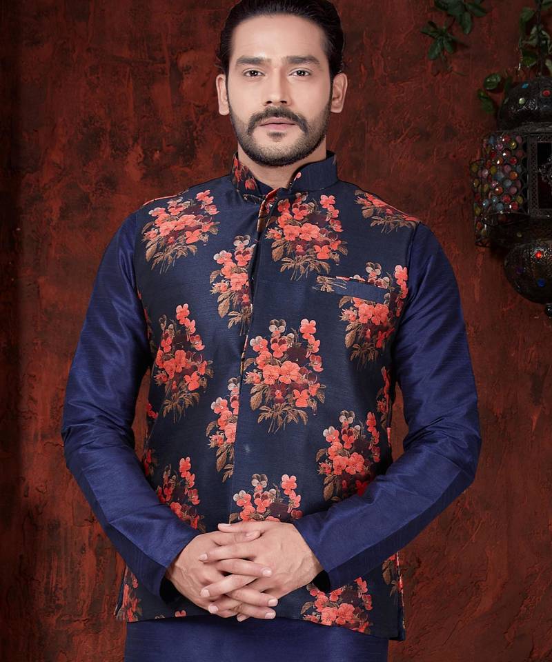 Navy kurta set with a striking floral nehru jacket—an elegant choice for festive occasions.
