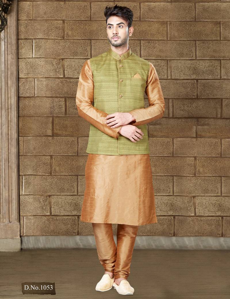 Olive-green textured nehru jacket with a matching pocket square, paired with a copper-gold kurta and trousers.