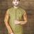 Olive-green textured nehru jacket with a matching pocket square, paired with a copper-gold kurta and trousers.