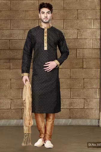 Black kurta with subtle gold motifs and gold-trimmed detailing, paired with brown trousers --an elegant festive wear