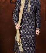 Navy kurta with rich gold motifs and trim, paired with gold trousers —perfect for festive celebrations.