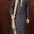 Navy kurta with rich gold motifs and trim, paired with gold trousers —perfect for festive celebrations.