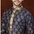 Navy kurta with rich gold motifs and trim, paired with gold trousers —perfect for festive celebrations.