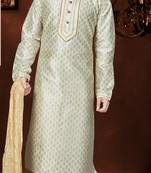 Off white printed kurta with gold-trimmed detailing, paired with gold trousers—an elegant festive look.