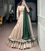 beige chanderi embroidered traditional lehenga choli upto 42