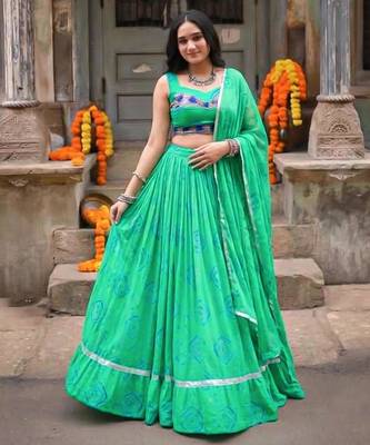 green cotton poly printed traditional lehenga choli upto 42 4