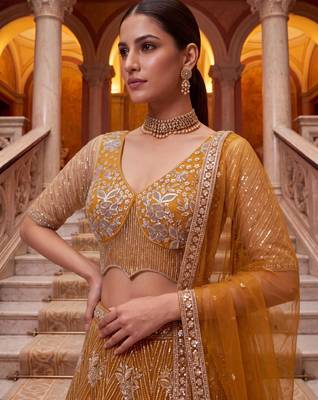 mustard net embroidered traditional lehenga choli 4