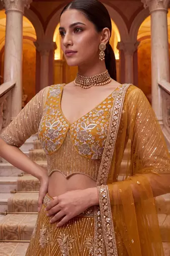 mustard net embroidered traditional lehenga choli