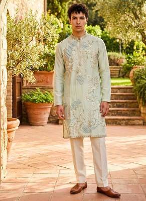 Cream tissue kurta pant set with embroidery and sequence work 1