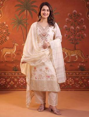 Cream silk blend embroidered churidar set 1