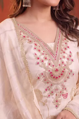 Cream silk blend embroidered churidar set