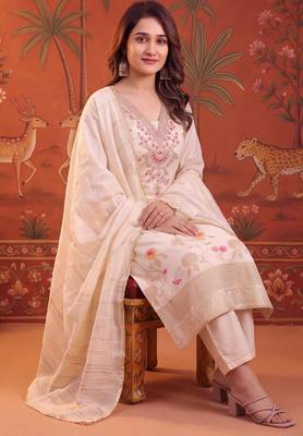 Cream silk blend embroidered churidar set 5