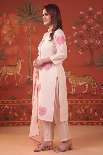 Off-white silk blend embroidered churidar set
