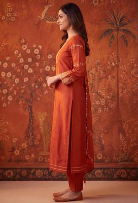 Orange silk blend embroidered churidar set 4
