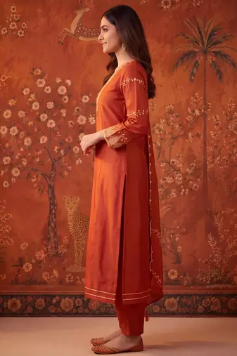 Orange silk blend embroidered churidar set