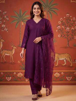 Wine silk blend embroidered churidar set 1