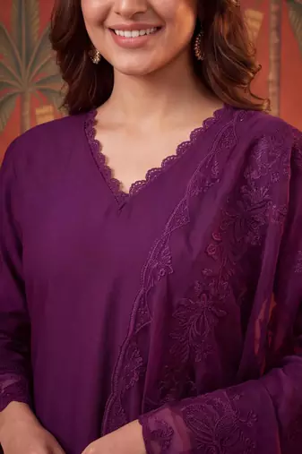 Wine silk blend embroidered churidar set
