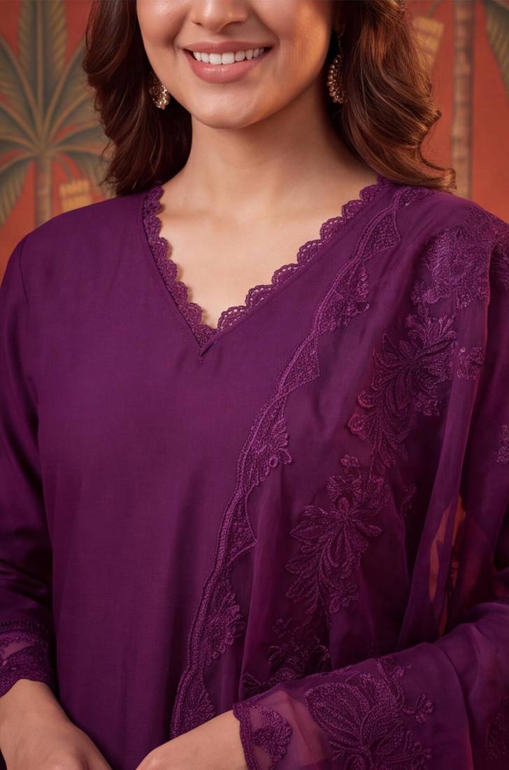 Wine silk blend embroidered churidar set