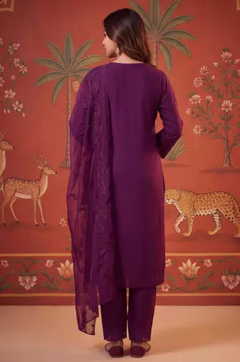 Wine silk blend embroidered churidar set