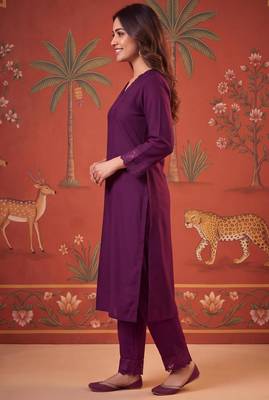 Wine silk blend embroidered churidar set 4
