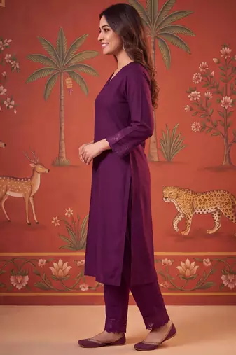 Wine silk blend embroidered churidar set