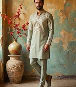 Light green lachka kurta pant set with embroidery and mirror work