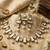 Gold oval kundan statement necklace set