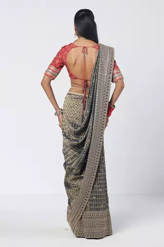 Teal blue and red embroidered crepe and silk brocade drape saree set