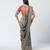 Teal blue and red embroidered crepe and silk brocade drape saree set